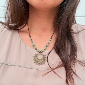 Bohemian Green Aventurine Beaded Necklace with Bronze Mandala Pendant.